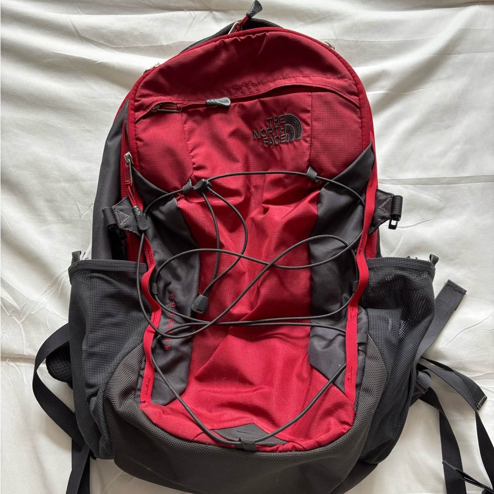 The North Face Red and Black Backpack for Outdoor Adventures